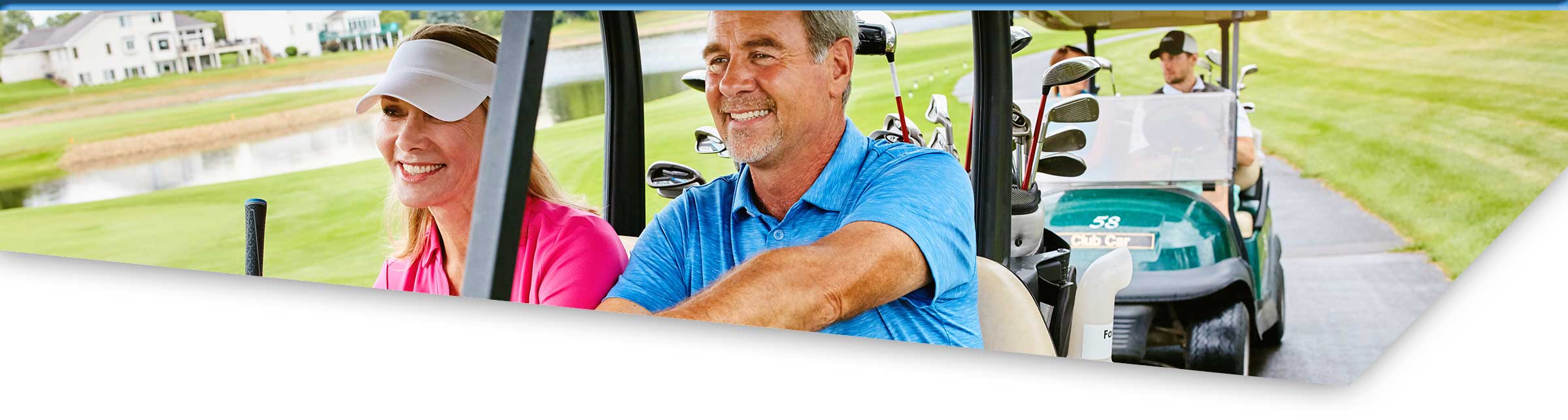 Mature couple and friends driving golf carts