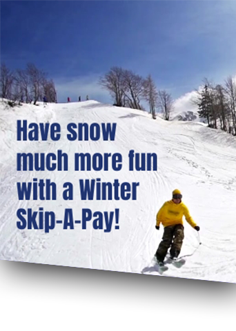 Man in yellow jacket skiing down a deserted slop having snow much fun.